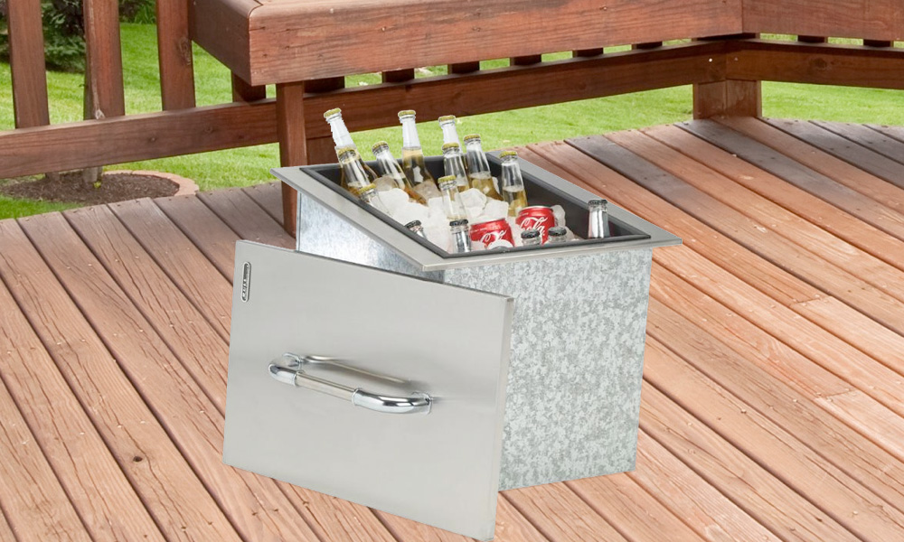 Stainless steel bull cooler component filled with ice, beer and soda with a red wood outside porch background