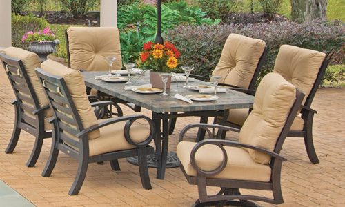 Outdoor dining table and chair set by Mallin Casual Furniture
