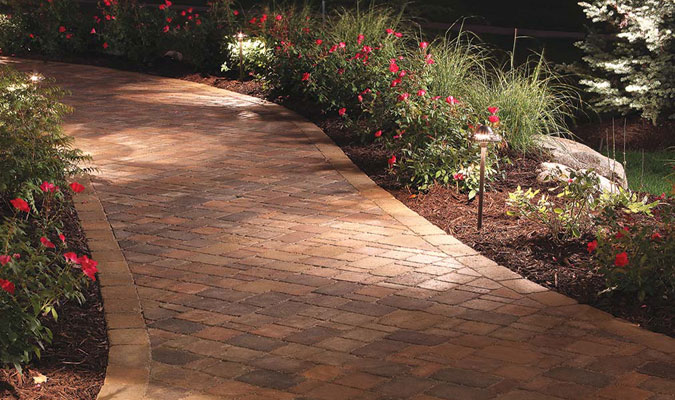 A night-time picture of a Pavestone walkway in Charlotte, NC