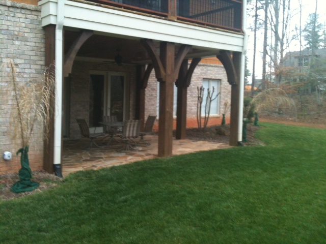 Constructed deck area with patio in Pineville, North Carolina