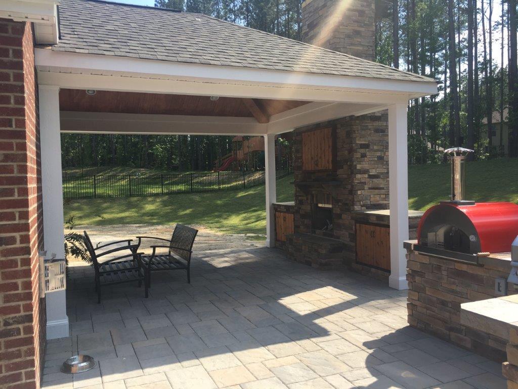 Patio construction with an outdoor fireplace in Charlotte, North Carolina