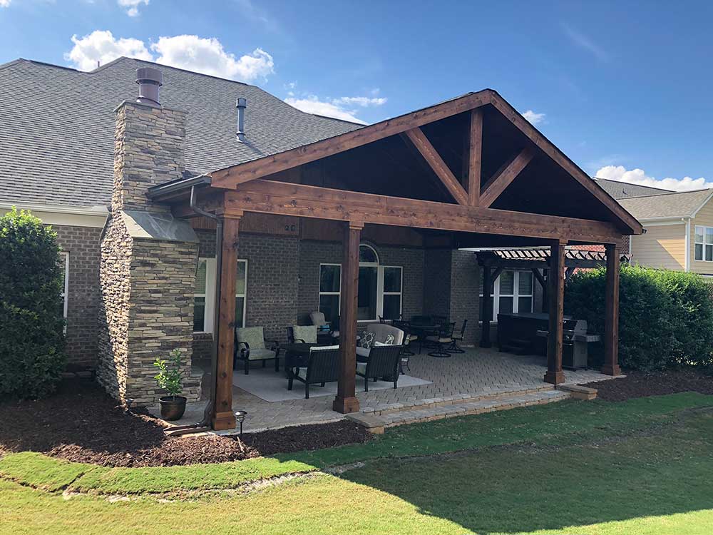 Porch construction with outdoor fireplace in Charlotte, North Carolina