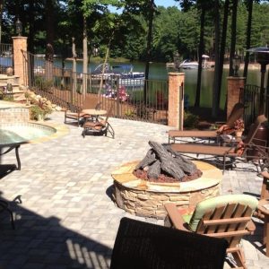 Backyard natural stone patio construction in Indian Trail, North Carolina