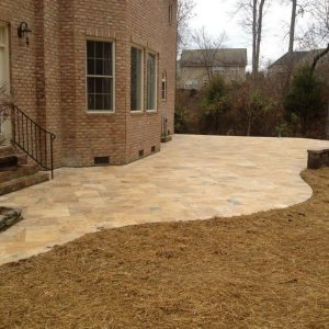 construction of a stone patio walkway in Charlotte, North Carolina