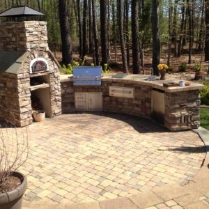 Outdoor kitchen construction with paved patio in Pineville, North Carolina