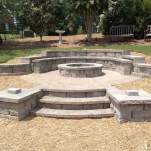 Fun Outdoor Living paved walkway and steps to a fire pit