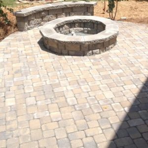 Construction of a stone fire pit by Fun Outdoor Living