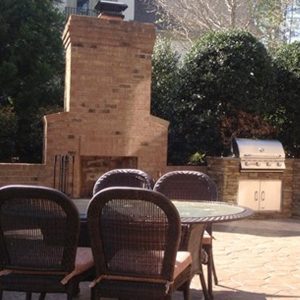Fun Outdoor Living Brick fireplace construction and installation