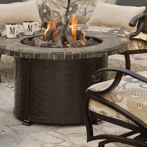 Close up of a fire table and patio furniture