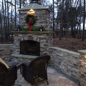 Brick and stone fireplace in winter