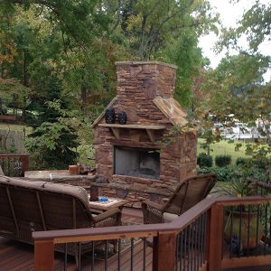 Brick and stone fireplace on deck