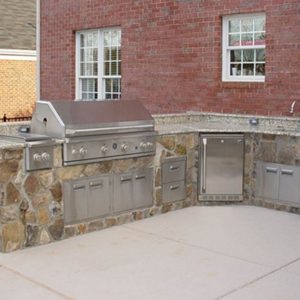 Fun Outdoor Living outdoor kitchen installation in a backyard in Cornelius, North Carolina
