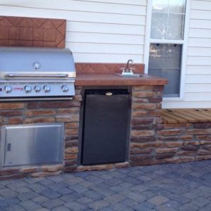 Outdoor kitchen along back of house in Indian Trail, North Carolina