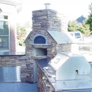 Side view of Fun Outdoor Living's installation of a pizza oven in Indian Trail, North Carolina