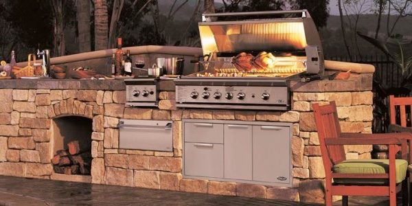 Outdoor kitchen with a DCS Grill