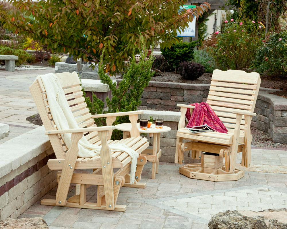 Wooden outdoor chairs on paved patio
