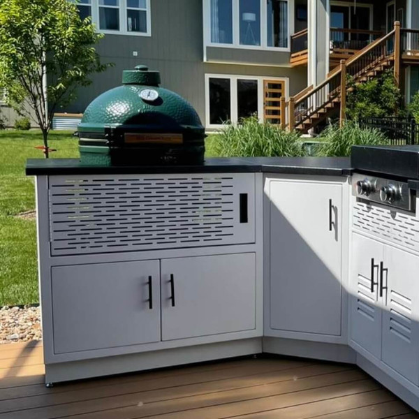 green egg grill in outdoor kitchen area