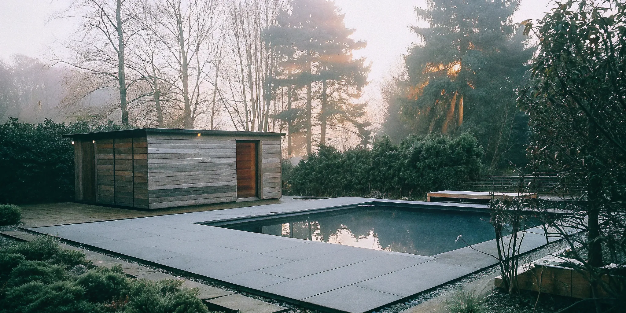 A backyard sauna and cold plunge pool for at-home hot cold therapy in Charlotte.