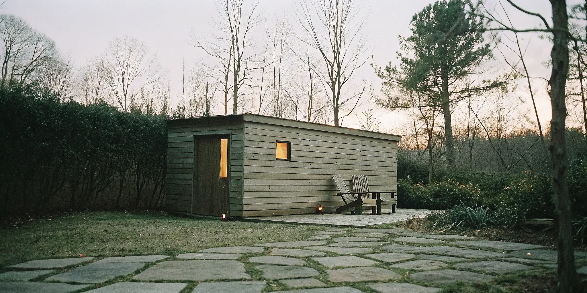 A modern home sauna with warm lights for a nightly sauna routine in Charlotte.