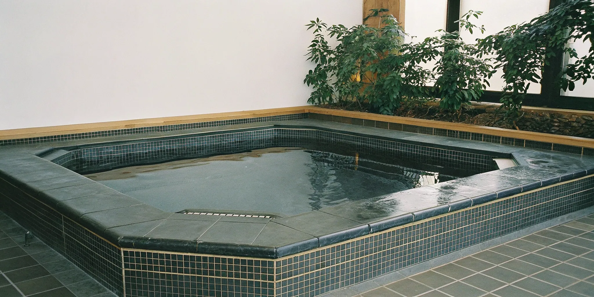 An indoor Hot Spring hot tub with a premium build, a key factor in hot tub prices.