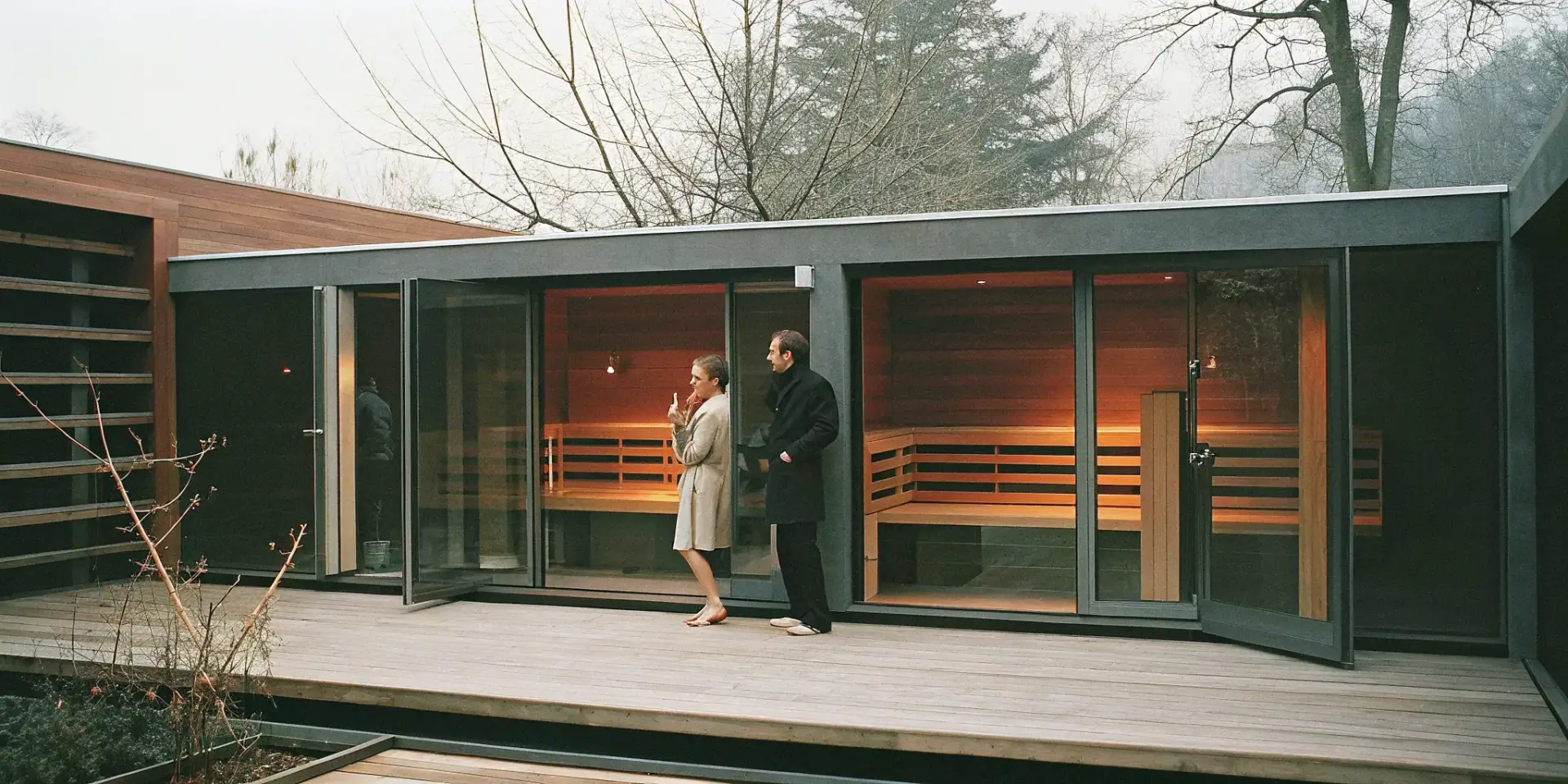 Modern outdoor sauna with glass doors at a Concord dealer showroom.