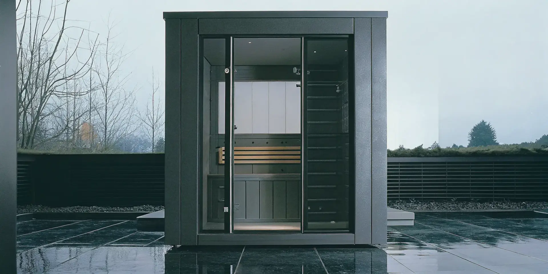 Modern outdoor sauna with a glass door from a professional Charlotte sauna builder.