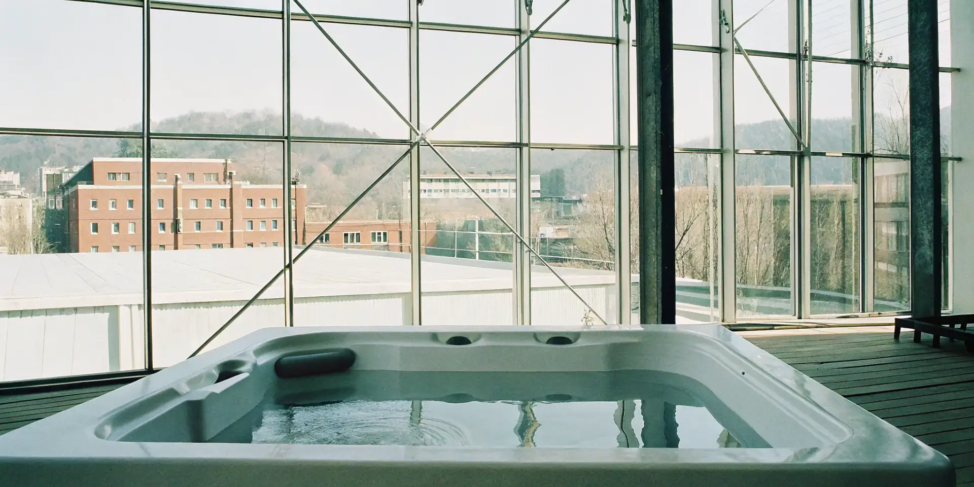 One of the best budget swim spas installed indoors in a Winston-Salem home.