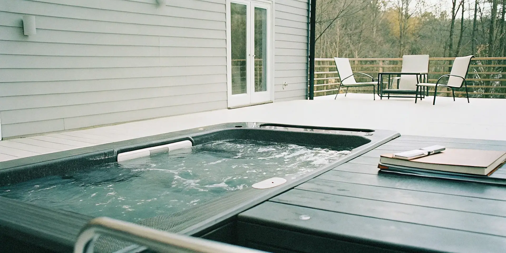 A swim spa on a modern deck, a purchase made possible with financing options in NC.
