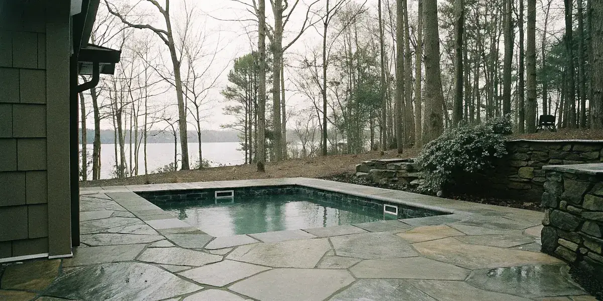 Backyard wellness design Lake Norman outdoor retreat with spa and fire feature